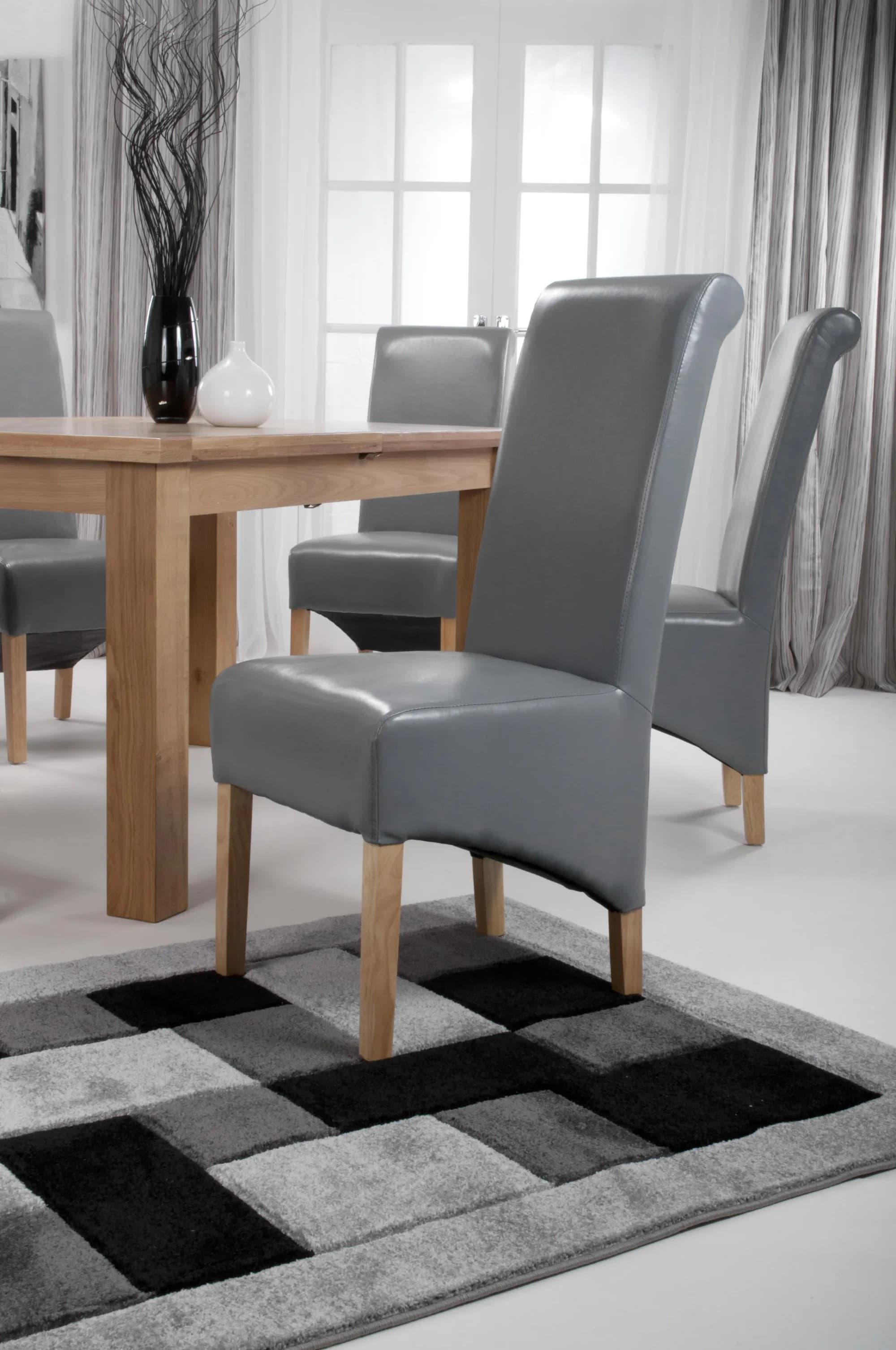 Krista Roll Back Bonded Leather Grey Dining Chair
